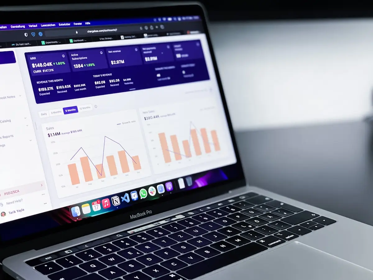 Analytics dashboard with performance charts on a laptop